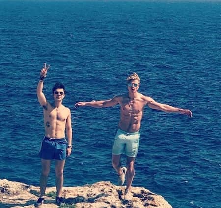 Tom Rhys Harries enjoying his holiday with his friend at Lone Rock